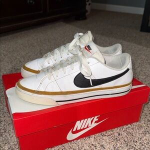 Nike Womens White and Black Sneakers with Gold Trim